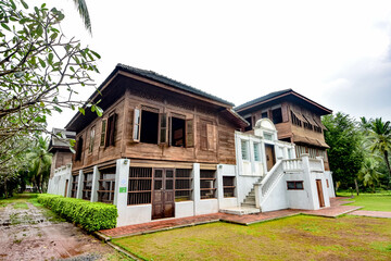 The ancient wooden houses of the wealthy in the past were made into a museum for tourists to visit in Ratchaburi, Thailand.