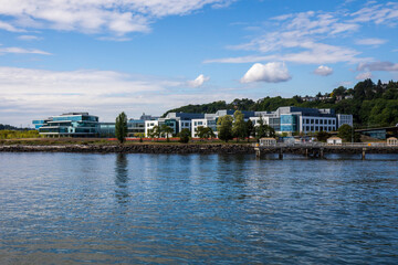 Fototapeta premium Seattle, Washington, USA - June 4 2021: Seattle skyline Expedia Group during summer. View from Elliott Bay. Space Needle. Washington state.