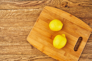 yellow lemon cutting board kitchen fresh food