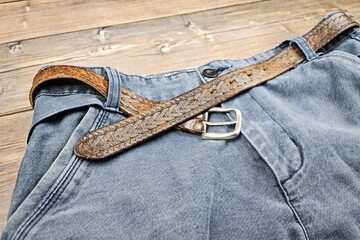 The Men's Trousers with a belt. Designer trousers. Blue trousers. Leather belt.