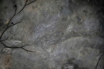 Grunge cement wall texture. Gray wall with cracks background. Scary gray background for Halloween. Abstract grunge stucco texture. Cracked surface of plaster.