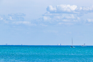 Fototapeta premium Boats yachts between Cozumel island and Playa del Carmen Mexico.
