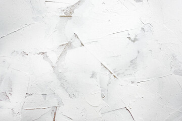 White putty background. White abstract texture of surface covered with putty. textured background...