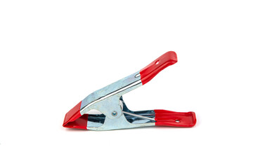 Metal clamp with rubber handle isolated on white background