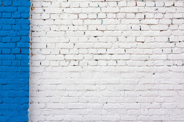 white ruined industrial brick wall