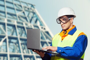 building contractor man Check and write down the details of the construction.