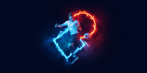 Art collage. Young man, professional football player in motion and action with ball isolated on dark background with neoned geometric figure