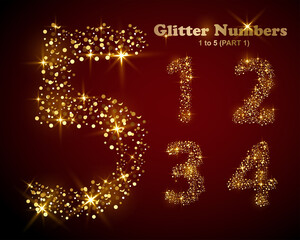 Glittter numbers made of golden particles and sparking shiny lights