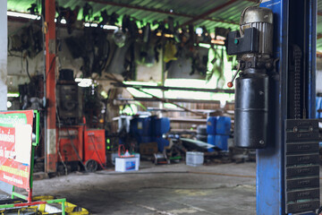 Hydraulic lift car for checking the suspension to make repairs.