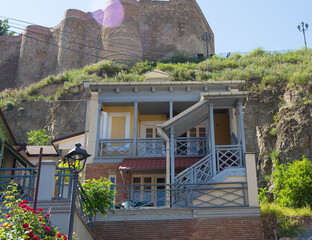 Modern Tbilisi architecture next to ancient ruins