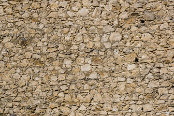 stone castle wall background from limestone segments