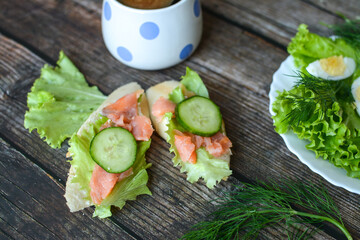 Healthy breakfast, salad, eggs and salmon