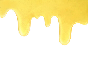 Yellow texture of dripping honey drops on a white background. A sample of cosmetic gel with bubbles. Cream with golden acid. Vitamin C. Hyaluronic acid. Cosmetic product, serum. The taste of honey.