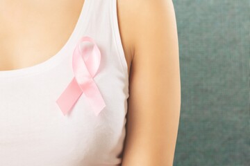 October Breast Cancer Awareness month, Woman with Pink Ribbon for supporting people
