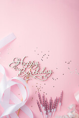 Pink happy birthday letters background with candles