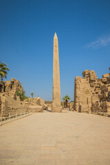 Anscient Temple of Karnak in Luxor - Ruined Thebes Egypt. Sacred obelisk with hieroglyphs in Karnak temple.Temple of Amon-Ra