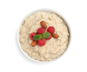 Tasty oatmeal porridge with raspberries and almond nuts in bowl on white background, top view