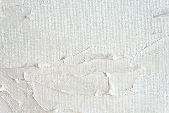 The White Painted Canvas Texture With Brush And Palette Knife Large Strokes For Arcitecture Modern Backgrounds. Closeup. View Above.
