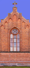 General view and architectural details in a close-up of the Neo-Gothic Catholic Church of Our Lady of the Angels erected in 1921 in the village of Czarna Wieś Kościelna in Podlasie, Poland.