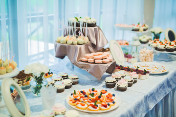 Delicious wedding reception candy bar dessert table