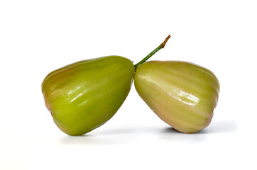 Two ripe and ready-to-eat rose apples, known as Jambu Madu Deli, has green  colour and has a very sweet taste. This species comes from Deli Indonesia.