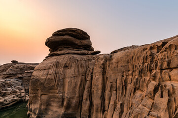 Fototapeta na wymiar Natural eroded large rocky rapid geological in the evening