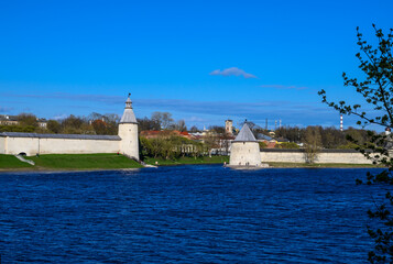 Flat and High towers. Historic site in Pskov. Fortress wall. Pskov Krom. sunny day.