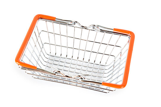 Supermarket shopping basket on light background. Empty metal wire basket. Black friday, sale, shopping concept. Sustainable lifestyle