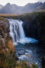 Naklejka na ściany i meble Waterfall in Long Exposure, Fairy Pools, Isle of Skye, Scotland