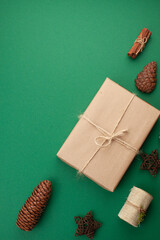 Christmas composition on a green background. View from above.