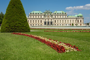 Famous Belvedere castle (Schloss Belvedere) surrounded by flowering gardens and a lake, Vienna, Austria
