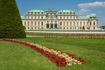 Famous Belvedere castle (Schloss Belvedere) surrounded by flowering gardens and a lake, Vienna, Austria