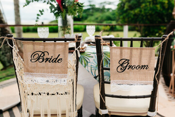 wedding decor - custom chairs for grooms