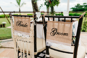 wedding decor - custom chairs for grooms