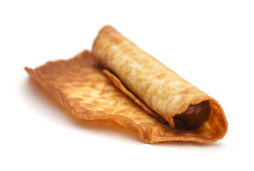 Homemade waffle cone with condensed milk isolated on a white background. Sweetness. Breakfast. Condensed milk. Dessert.
