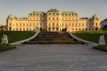 Fototapeta na wymiar Famous Belvedere castle (Schloss Belvedere) surrounded by gardens with fountains and classic statues, Vienna, Austria