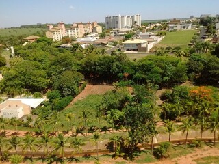 Top view of the city of Olympia with trees and buildings. Interior of São Paulo - Brazil.  - obrazy, fototapety, plakaty