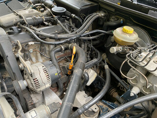 Car crash open hood car mechanic to check condition of damage. See the radiator cooling panel...