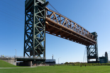 Burlington, ON, Canada - October 27, 2021:  The Burlington Canal Lift Bridge  returning to the lower position after a ship passed through,  Burlington, ON, Canada.  
