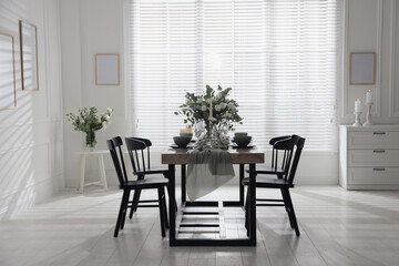 Festive table setting with beautiful tableware and decor indoors