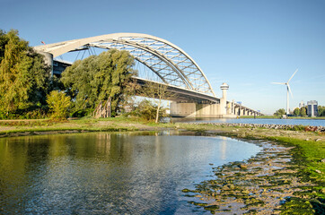 Rotterdam, The Netherlands, October 28, 2021: view of Van Brienenoord bridge as seen from the island with the smae name