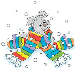 Merry little pup playing in a long colorful striped scarf and mittens, vector cartoon illustration isolated on a white background