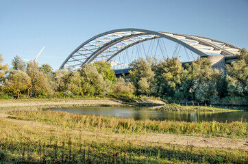Rotterdam, The Netherlands, October 28, 2021: new tidel nature on Van Brienenoord island, with tin the background the bridge with the same name