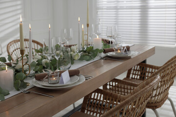 Festive table setting with beautiful tableware and decor indoors