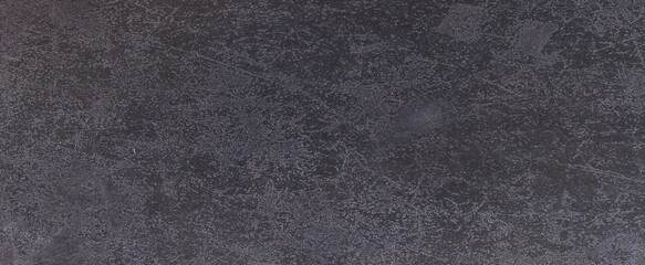 Brown peeling paint on the wall. Old concrete wall with cracked flaking paint. Weathered rough painted surface with patterns of cracks and peeling. High resolution texture for background and design.