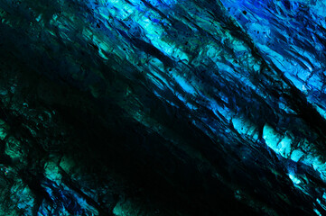 Labradorite blue specimen close-up macro detail semi-precious gemstone texture uncut, unpolished rough raw