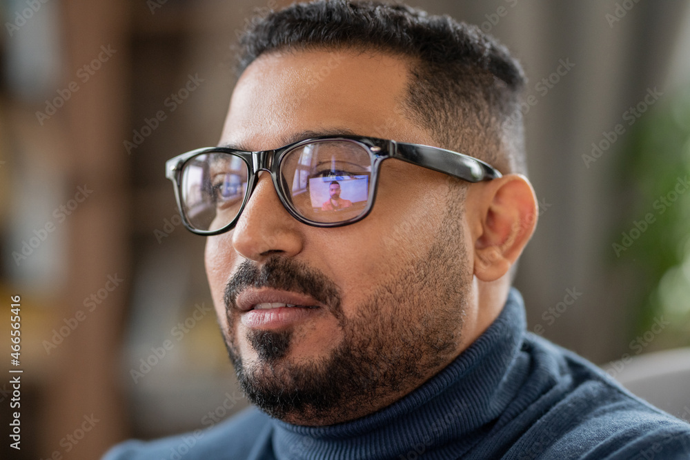 Aufkleber head of mature man in eyeglasses sitting in front of laptop and looking at student on screen during 
