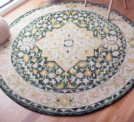 Modern multicolour rounded living area floor rug, interior room floor carpet texture design.
