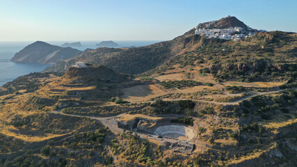 Aerial drone photo of iconic ancient theatre of Milos island where statue Venus of Milo was discovered, Cyclades, Greece © aerial-drone