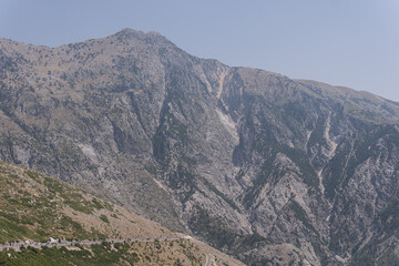 Fototapeta premium The Ceraunian Mountains, a mountain range located in the Balkan country of Albania is a beautiful sight to see when traveling to the small beach village of Dhermi.